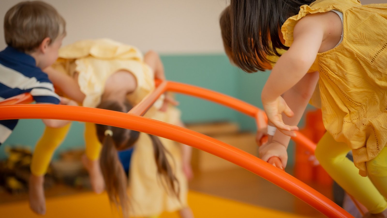 Children playing and climbing in the exhibition «CaccHho CucchhA»